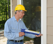 Technican-sealing-air-leaks air leaks in your home, Boston, Shrewsbury MA